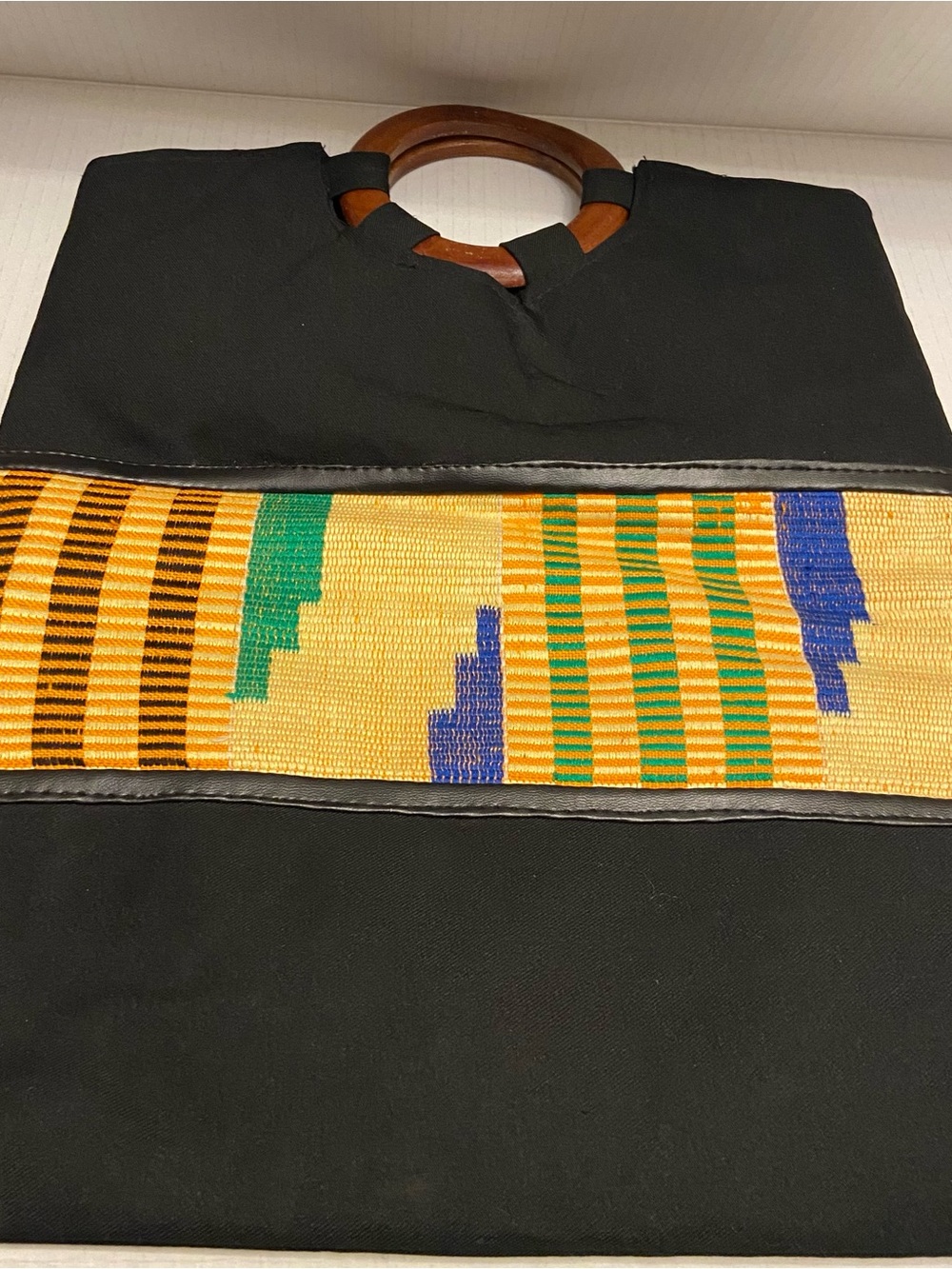 Women’s Black Tote Clutch Bag with Colorful Kente Stripe and Wooden Handles. - Picture 7 of 7